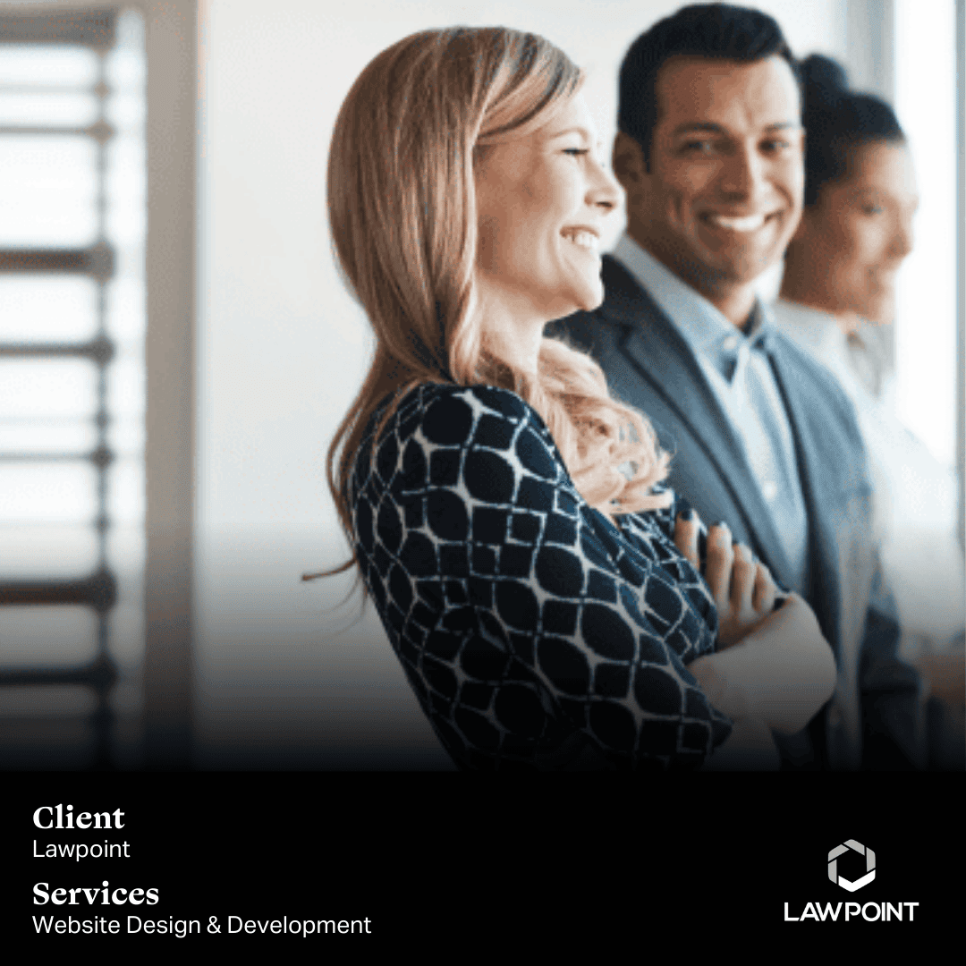 A group of smiling professionals standing in a bright office, showcasing collaboration and confidence. Client: Lawpoint, Services: Website Design & Development.