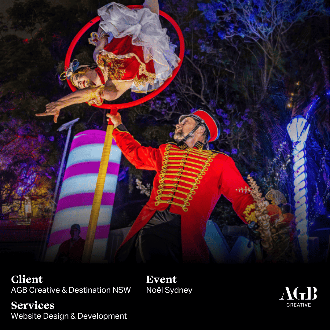 A festive outdoor performance featuring a performer in a red ringmaster outfit supporting an aerialist in a red and white costume during a colorful nighttime event. Client: AGB Creative & Destinations NSW, Event: Noel Sydney, Services: Website Design & Development.